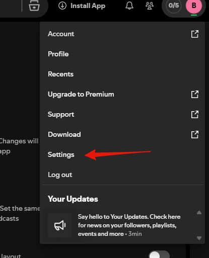 Step 2: the Spotify profile menu, with Settings near the bottom